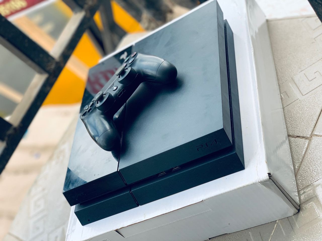 Sony PlayStation 4 (fat) Computer Entertainment Console plus extra controller and 10 games installed